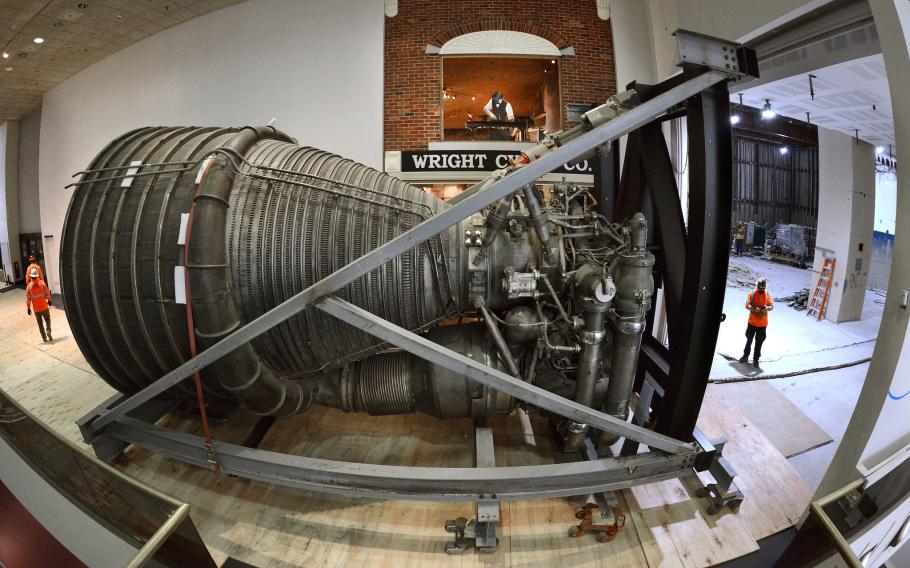 F-1 test engine being transported on the museum floor
