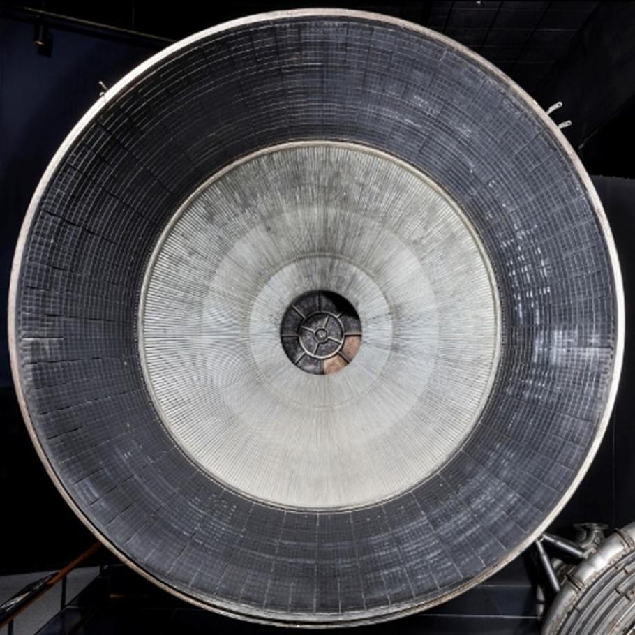 Looking into the F-1 nozzle, the injector plate (with holes to inject propellants and added baffles for combustion stabilization) is visible in the center. (Smithsonian Institution)