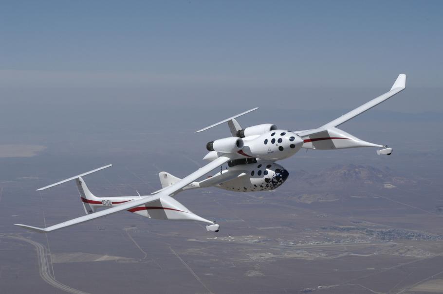View of SpaceShipOne in flight attached to White Knight