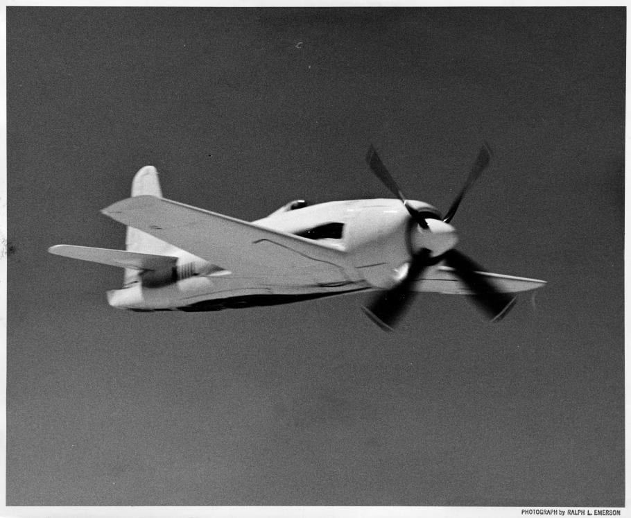 Greenamyer's Conquest I in flight, seen flying upside down.