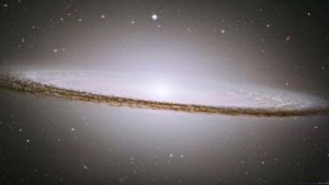 A side view of a disk shape galaxy.
