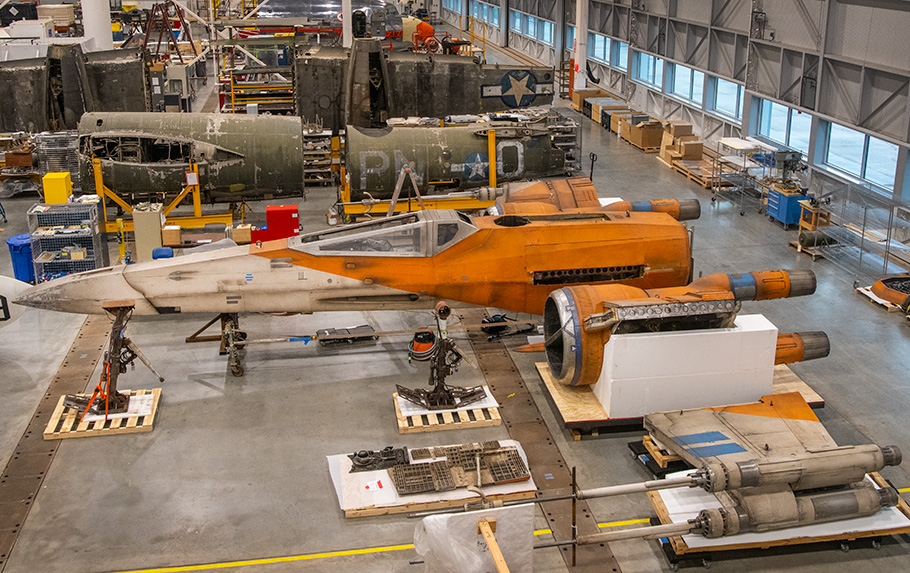 A Star Wars X-Wing Fighter is being constructed and conserved in the Mary Baker Engen Restoration Hangar at Steven F Udvar-Hazy Center in Chantilly, VA.