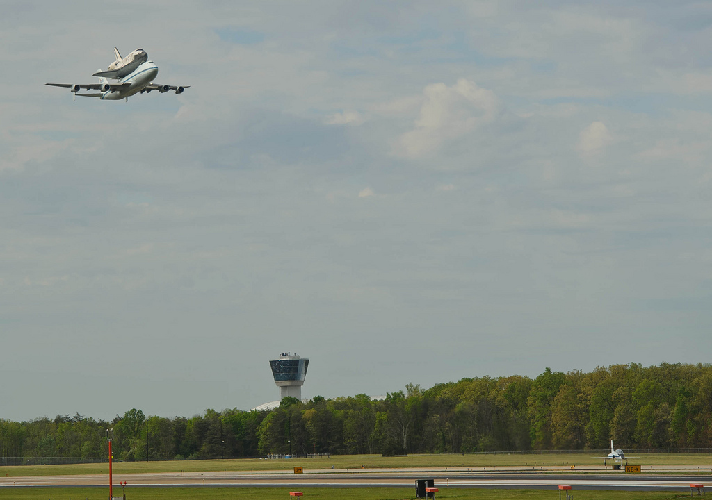 Space Shuttle Discovery Flies over Dulles Airport