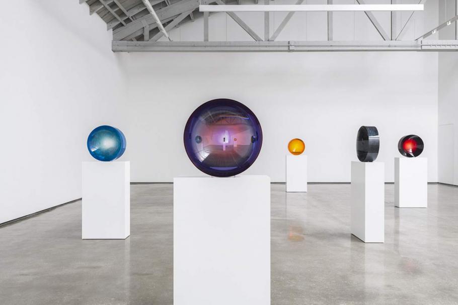 Spherical art in a gallery.