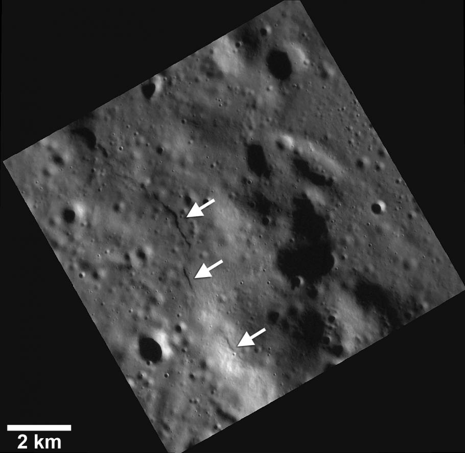 Scarps, or tectonic landforms that consist of rising land, are visible as small areas of land on Mercury. This set of scarps are pointed out using white arrows that reveal the scarps to look like lines carved in the crust of Mercury.