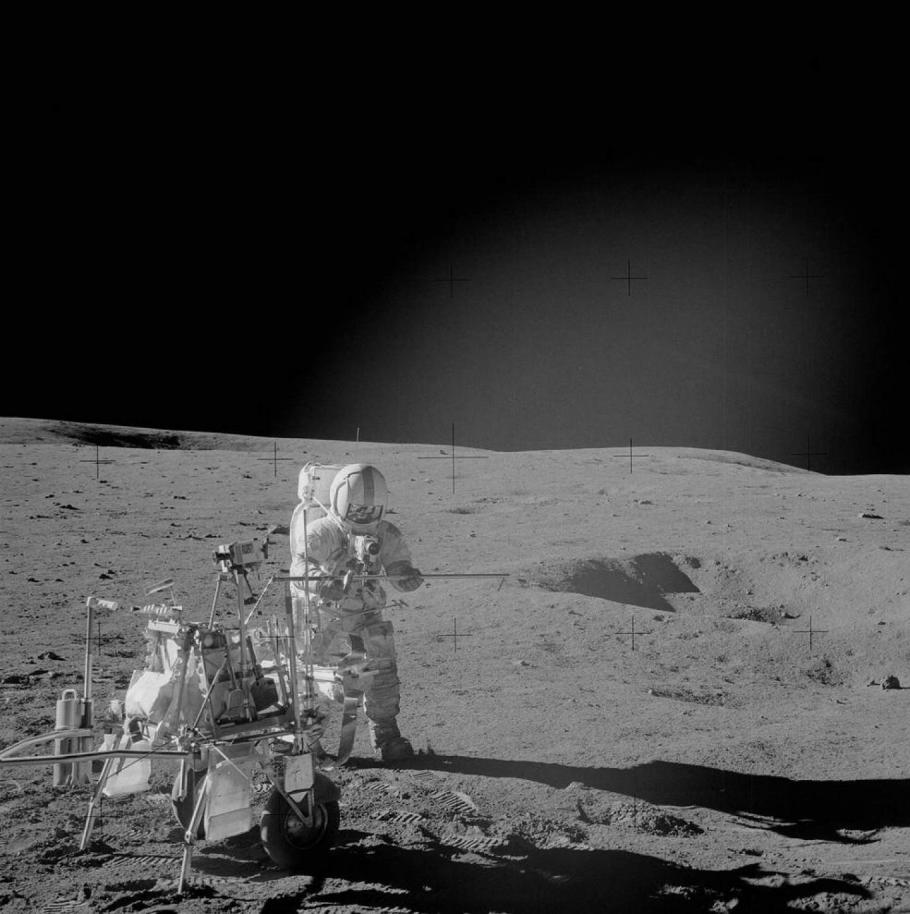 Shepard stands near the Apollo 14 MET