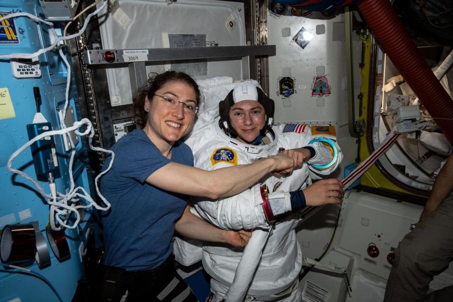 Astronaut Christina Koch (left) poses for a portrait with flight engineer Jessica Meir