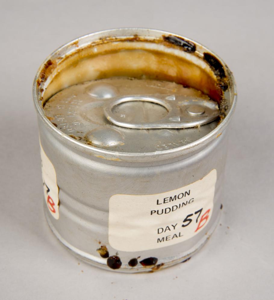 Can of lemon pudding with detaching lid, before treatment           