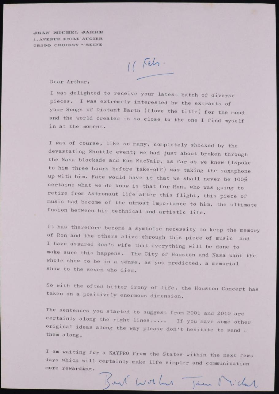A typewritten page with a message to Arthur Clarke, signed in blue ink.