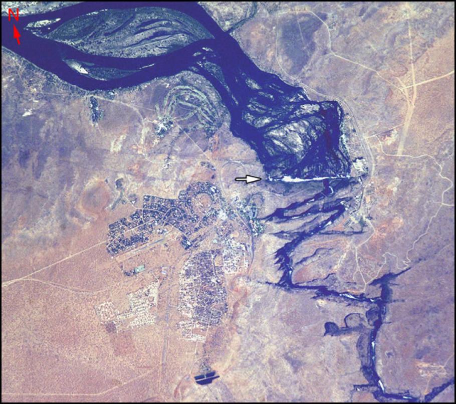 Satellite image of the Zambezi River. An arrow points to a large waterfall.
