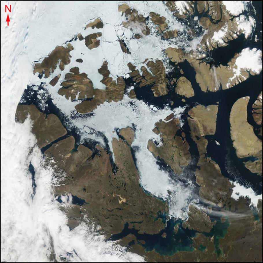 Satellite image of a group of northern islands in the Arctic Sea.