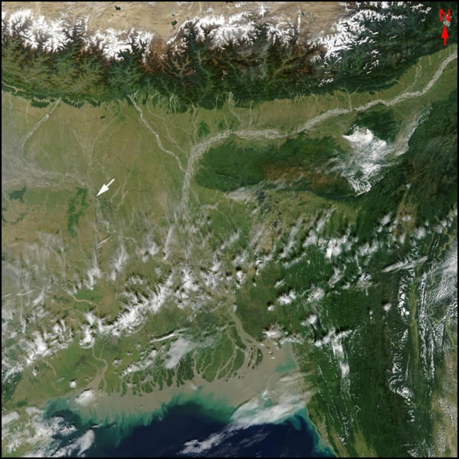 Satellite image of a series of rivers. An arrow points to a river in the northwest corner of the image.