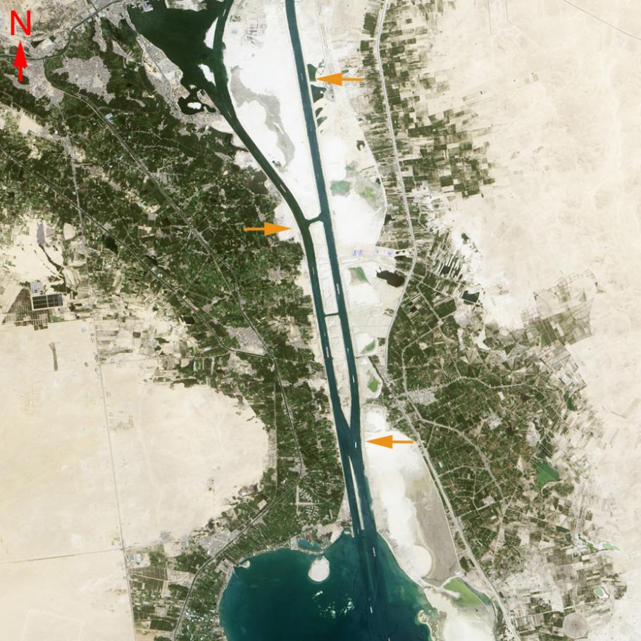 Satellite image of a waterway with arrows pointing to it. 