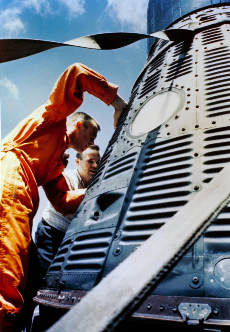 Alan Shepard looking into the Freedom 7 capsule