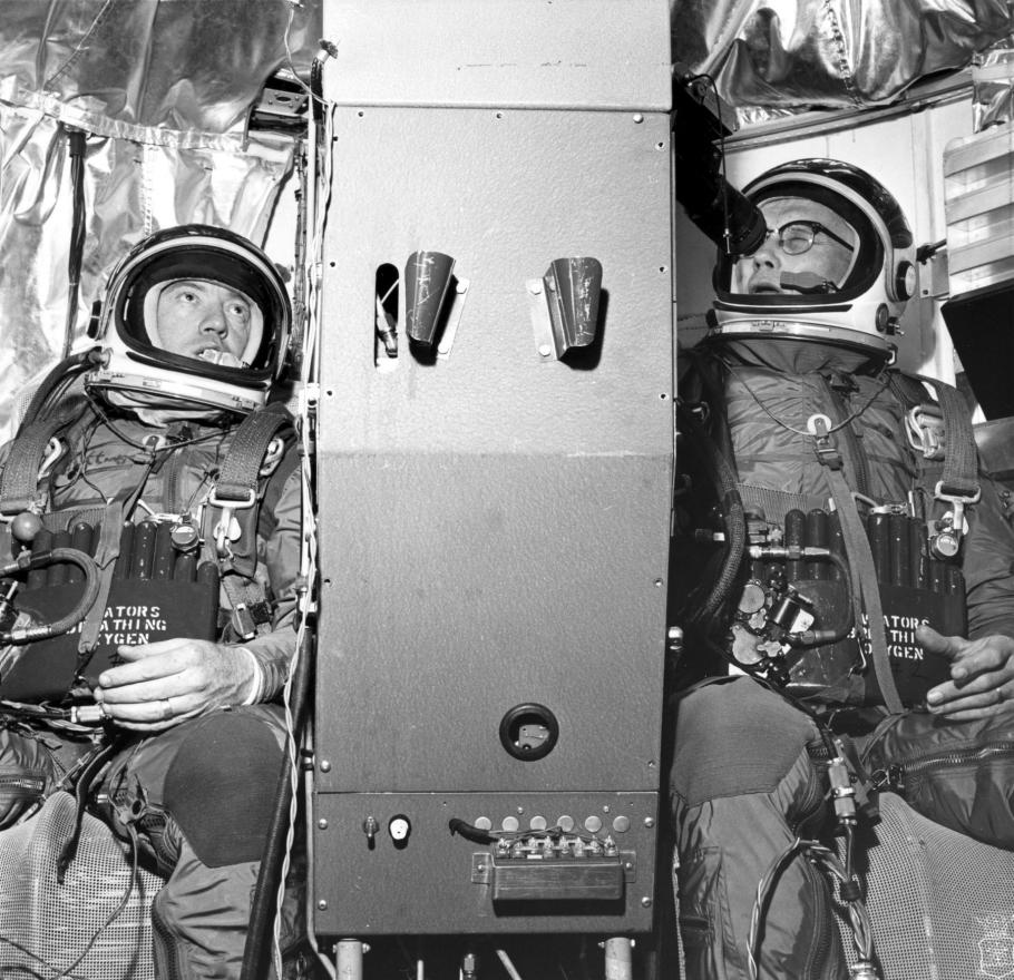 Black and White photo of Joseph W. Kittinger, Jr., and William C. White seated in their positions within the Operation Stargazer gondola.