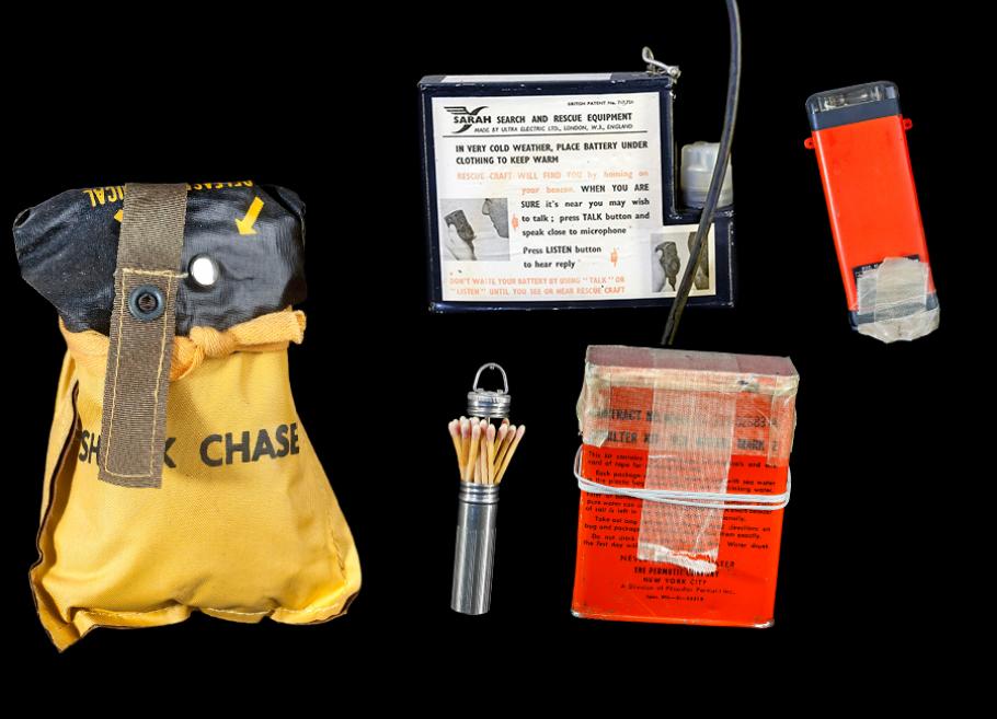 A composite image showing matches, a radio, strobe lights, and a shark chaser against a black background. 