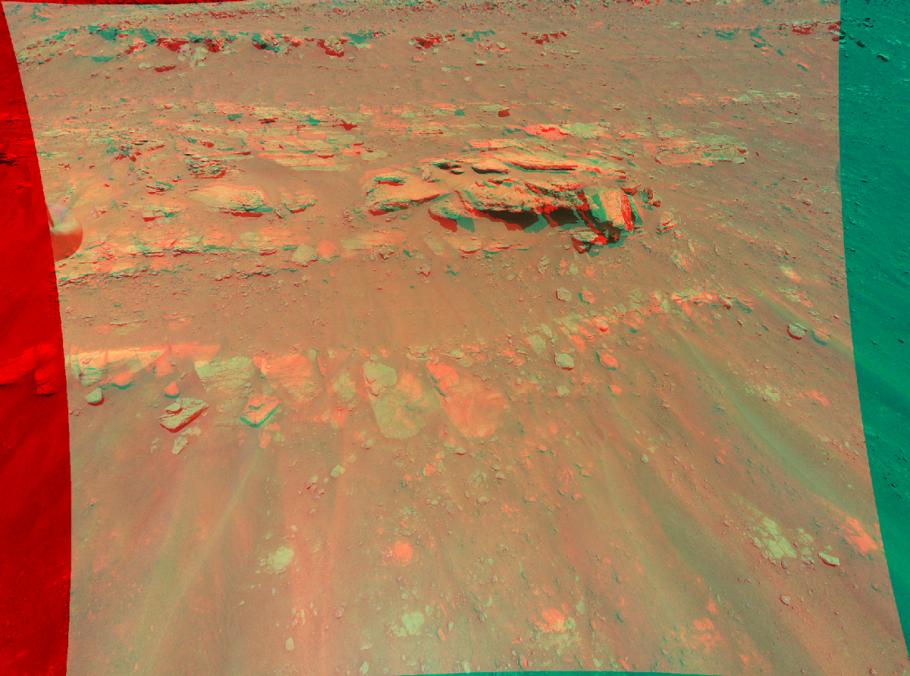 An image of a 3D view of the surface of Mars from from the perspective of the Ingenuity helicopter.