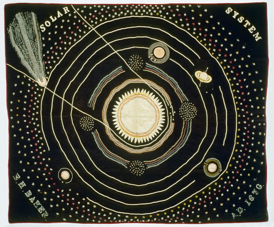 A wool quilt artwork that depicts the solar system.