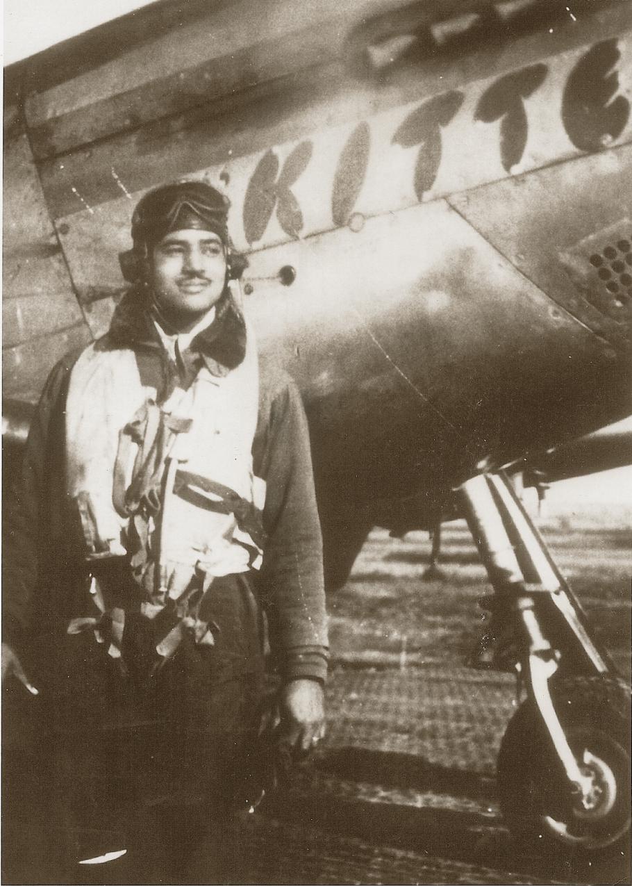 man stands in front of aircraft