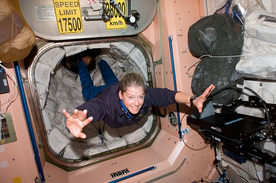 Astronaut Pam Melroy floats in zero gravity in the International Space Station