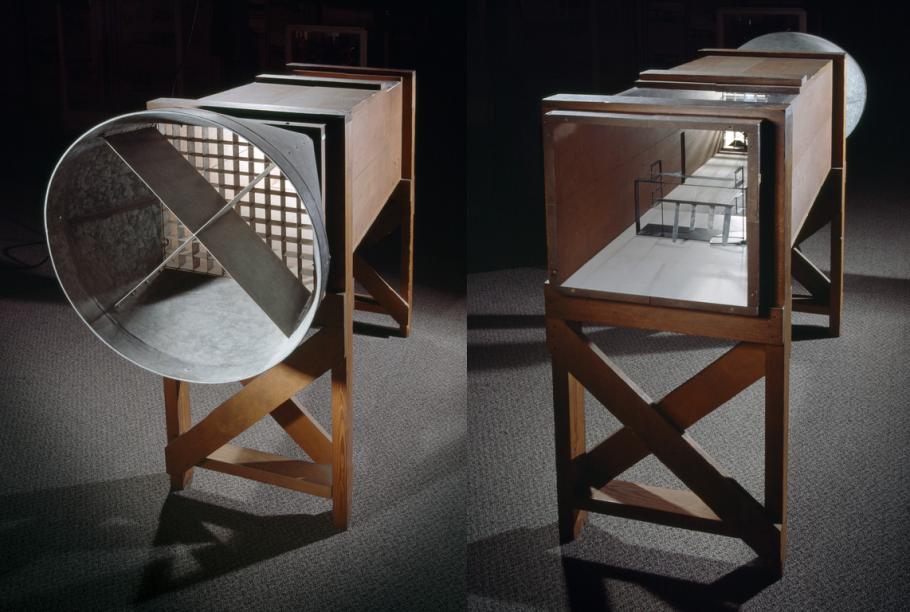 A rectangular shaped wooden wind tunnel seen facing two different directions in a side-by-side comparison.