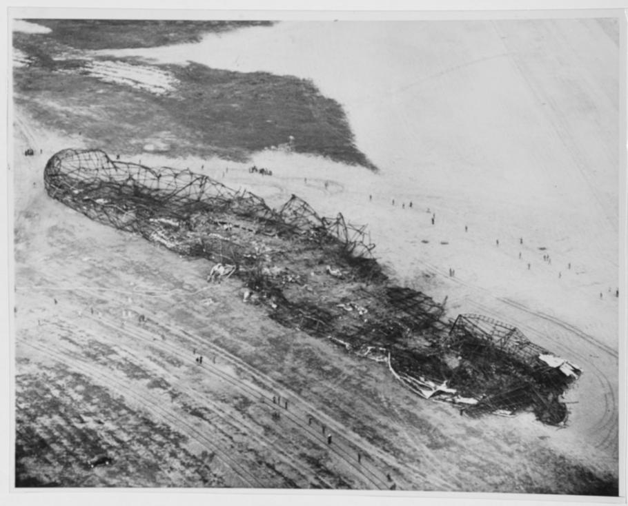 A aerial view of a crash site of a larger aircraft.
