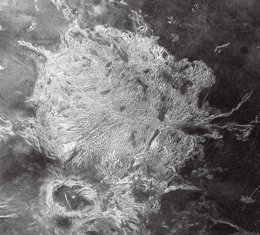 Black-and-white radar image of tesserae: unusual landforms on Venus that consist of upland plateaus that have very dense tectonic folds, ridges, and valleys. 