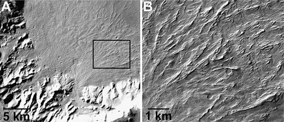 Two topographical images, the one on the left is labeled "A" with a smooth area at the center of a curve. On the right, is a bumpy topographical image.