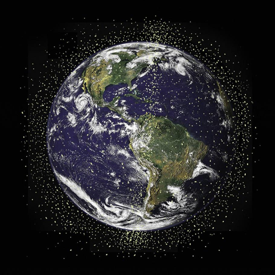 A NASA graphic depicts small dots swarming around the Earth—a representation of the millions of pieces of human-made debris and micrometeoroids currently orbiting at speeds averaging 22,000 mph. 