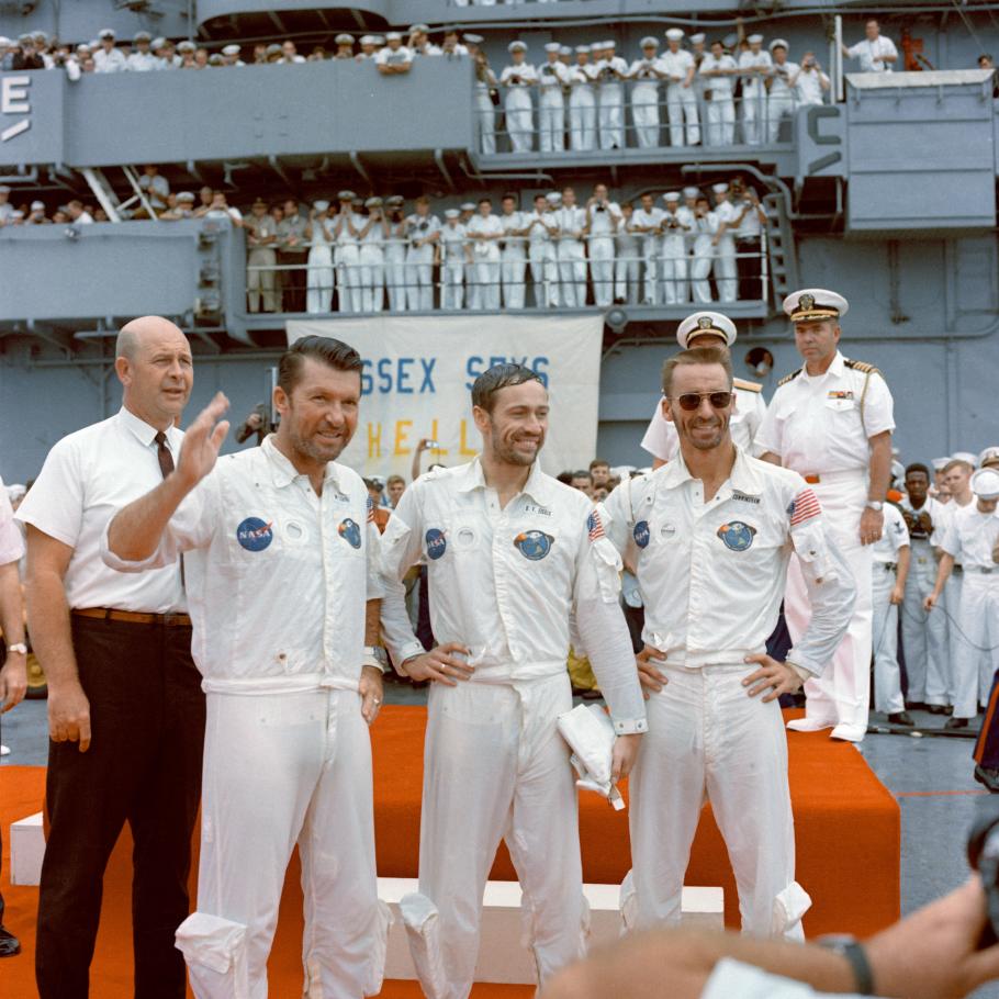 [Left to Right] Walter M. Schirra Jr., Donn F. Eisele, and R. Walter Cunningham aboard the USS Essex after the Apollo 7 splashdown. (Image courtesy of NASA)