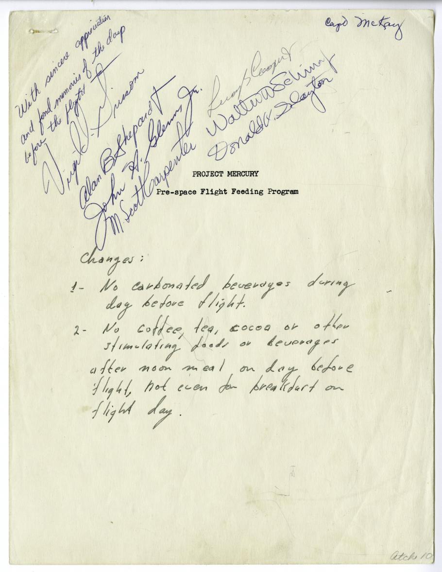 Typed page of information with signatures of astronauts in upper left hand corner