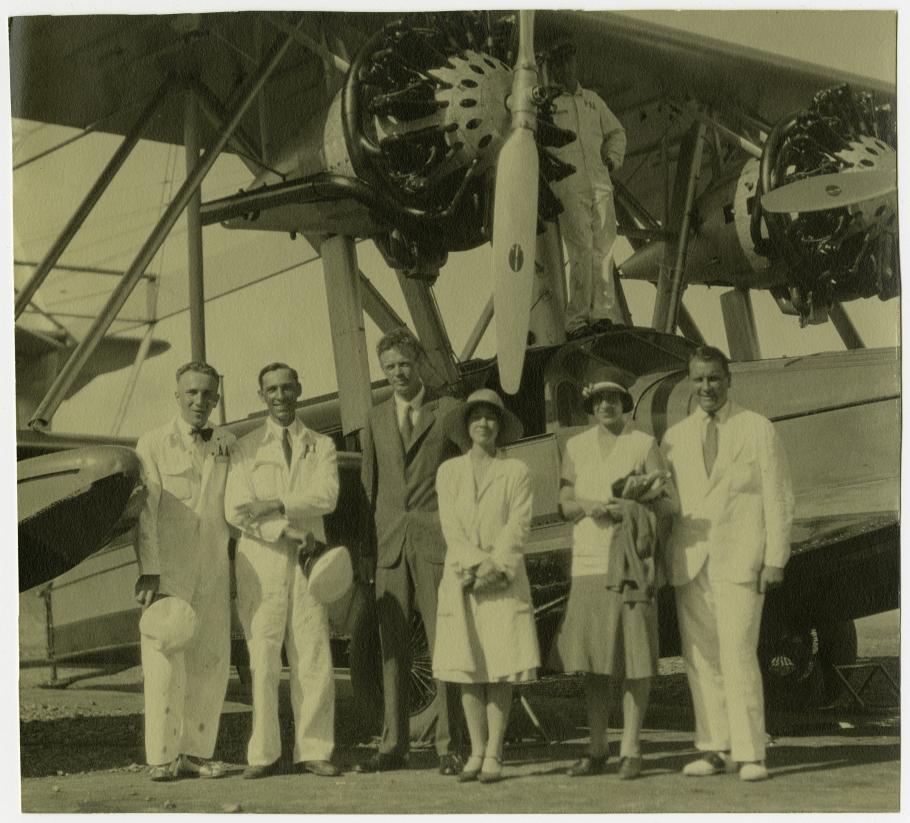 Photo of Charles and Anne Lindbergh with Betty and Juan Trippe and Pan American Airways personnel by a PAA S-38 amphibian.