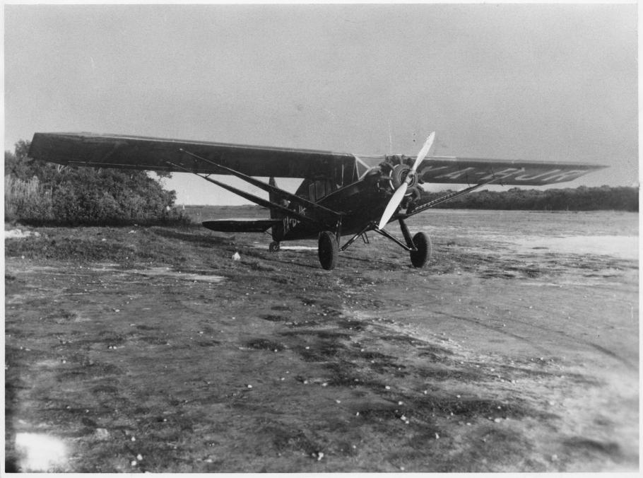 Three-quarter right front view of a propeller-driven airplane