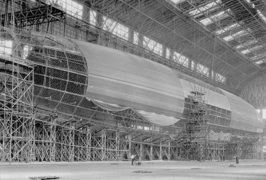 A view of Shenandoah from the side inside its hangar as it receives its outer layer of fabric.