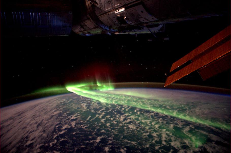 A streak of light is seen across the Earth from space.