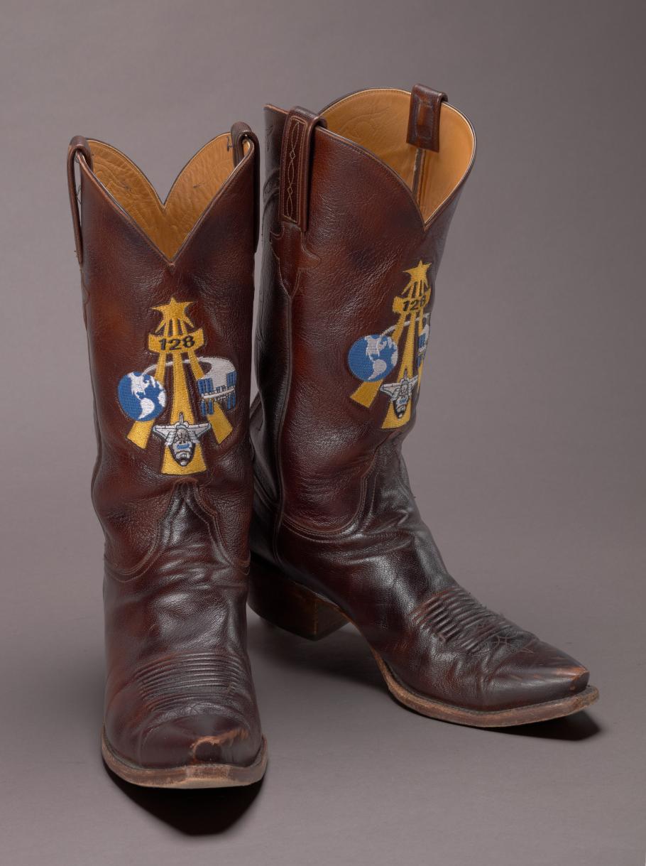 Cowboy boots made of leather.
