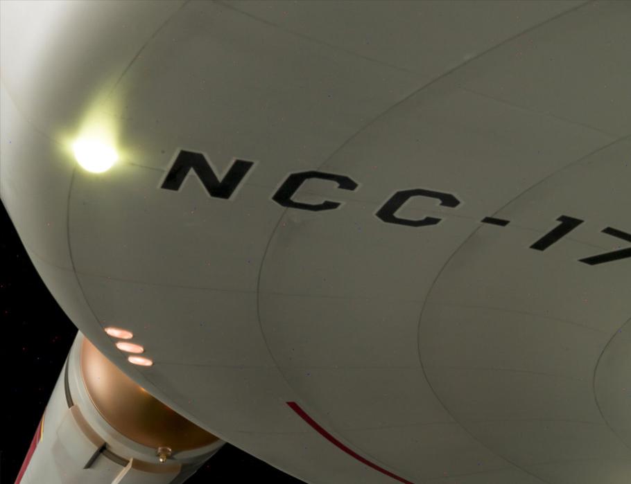 NCC-17 can be seen in black block letters on the bottom of the starship's disk. 