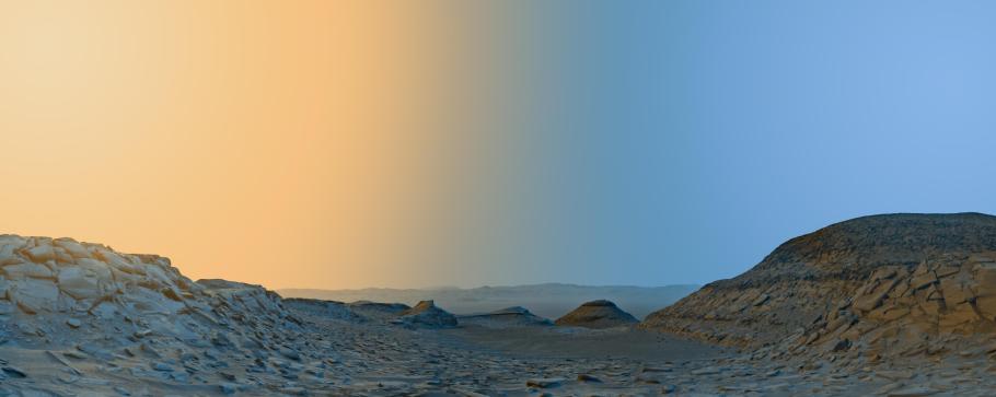 Panoramic view of the Martian surface at twilight with a clear sky transitioning from blue to orange gradient.