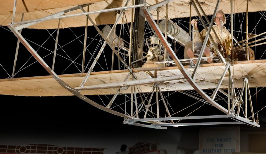 A vintage aircraft's ski-like skids on black background.