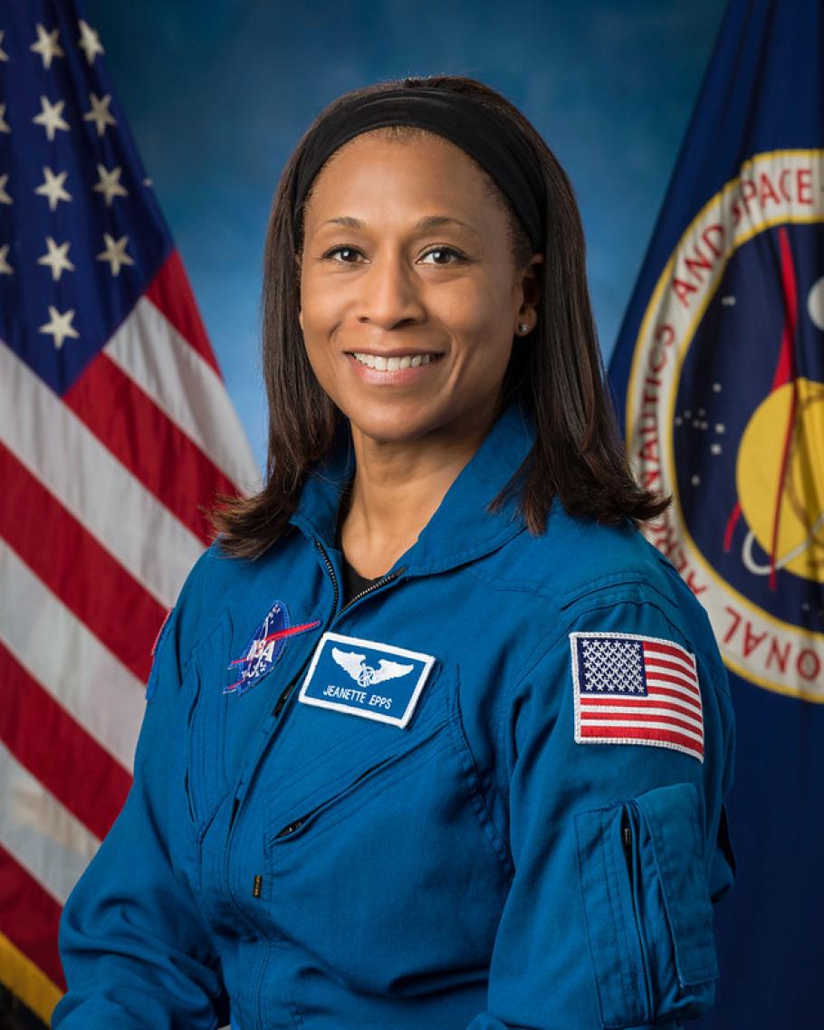 Official NASA portrait of Jeanette Epps wearing a blue astronaut flight suit.