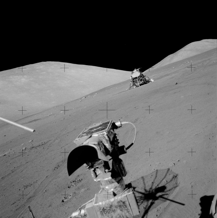 The arrow points to the rock on the lunar surface from which touchable samples were cut.
