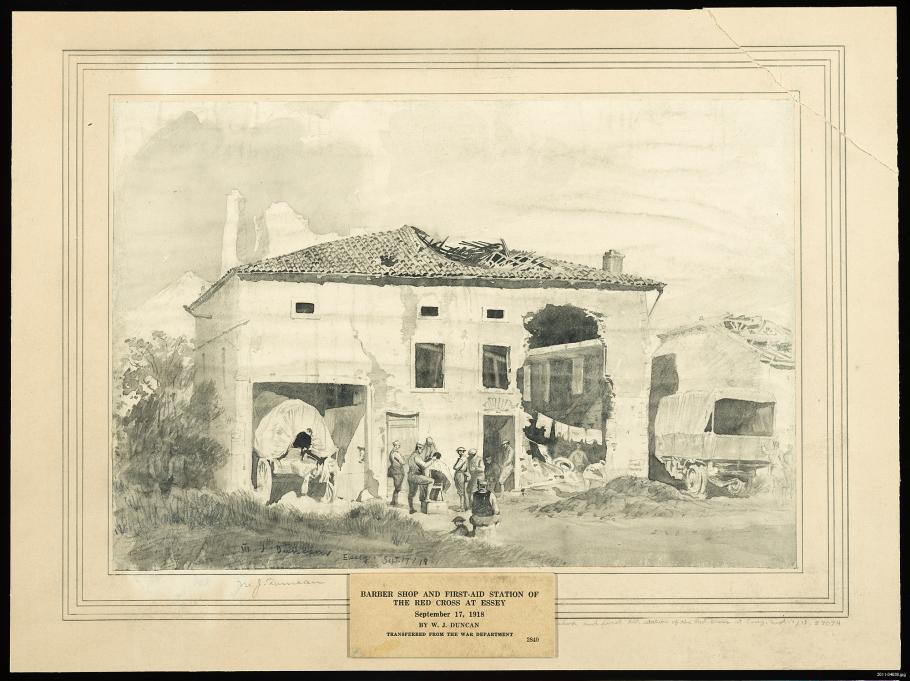 Damaged building with soldiers standing outside. 