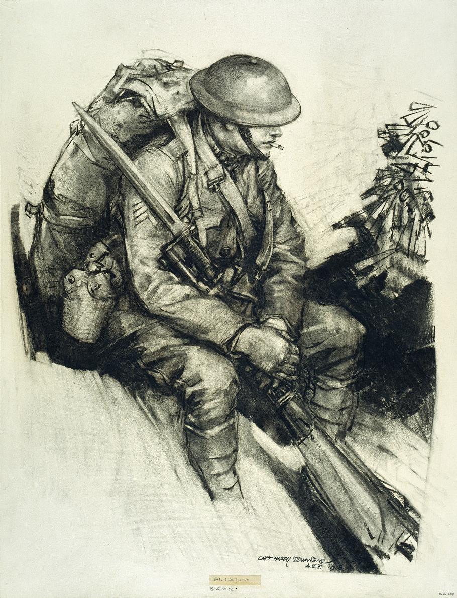 Soldier sits with pack on back and rifle in hand. 