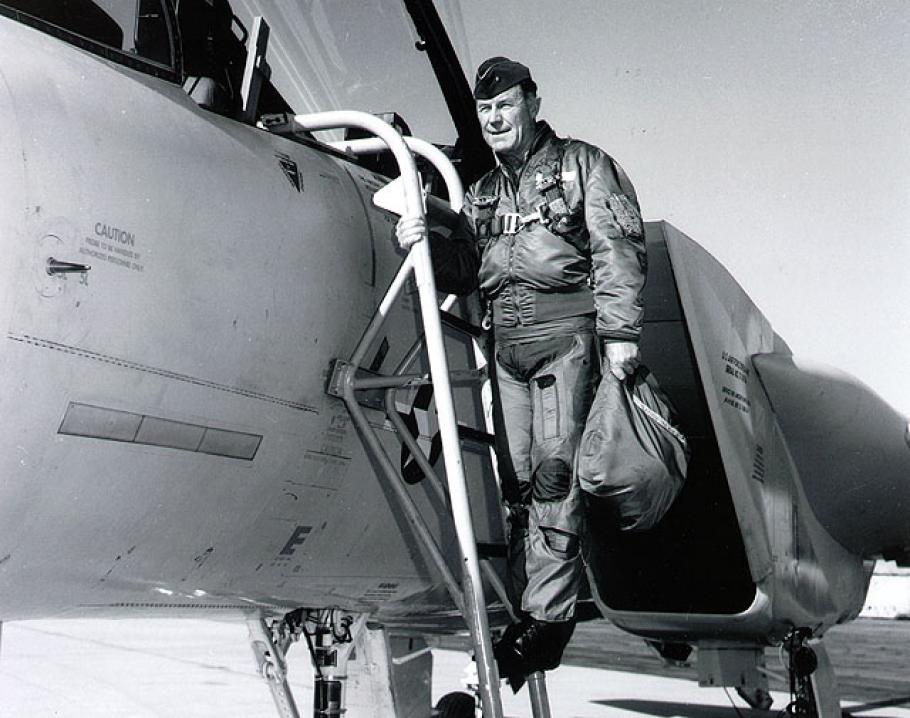 Chuck Yeager stands on ladder outside F-15B