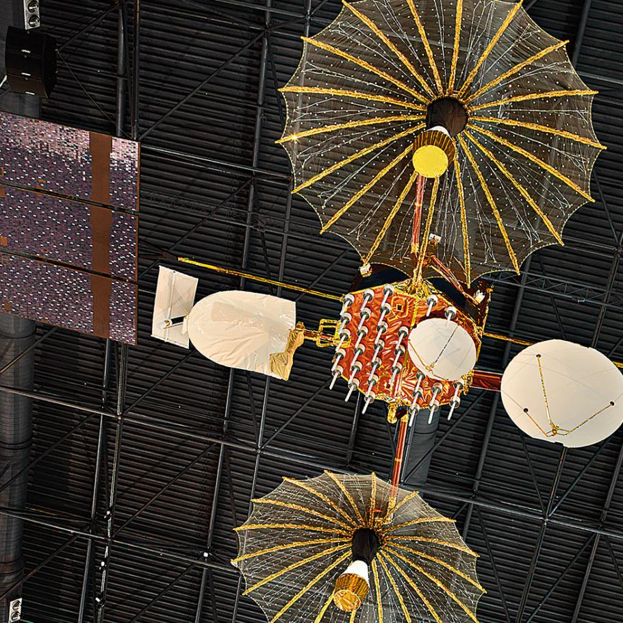A satellite device with panel and umbrella shaped modules.