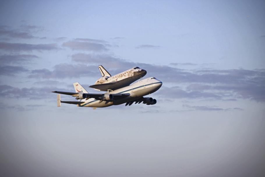 Space Shuttle Discovery Leaves Kennedy Space Center