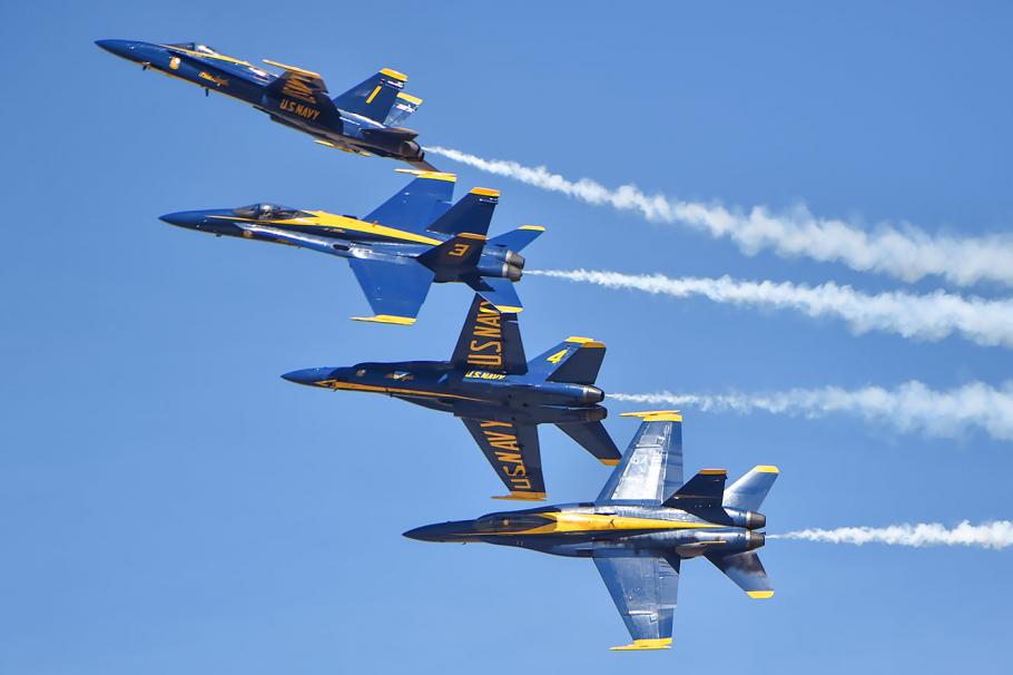 Blue Angels F/A-18C Hornets flying in formation during an airshow