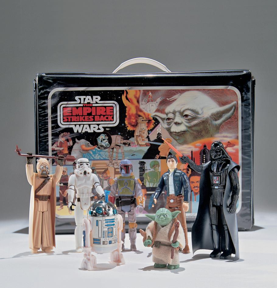A set of Star Wars toys manufactured for the release of The Empire Strikes Back, 1980. Pictured are R2-D2, Han Solo, Darth Vader, Yoda, Boba Fett, and a Storm Trooper, among others.