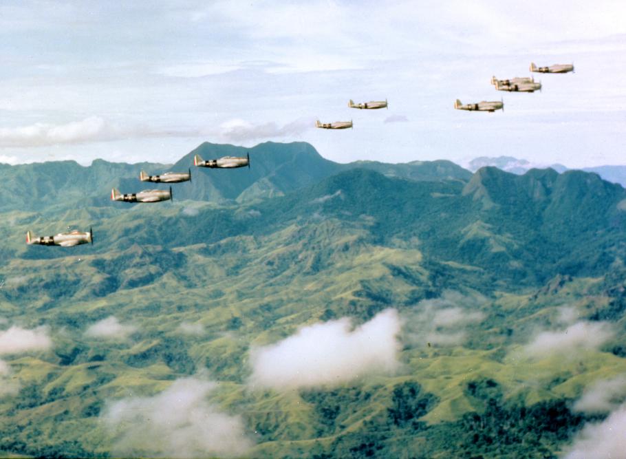 Mexican P-47 Thunderbolts fly over central Luzon in July 1945