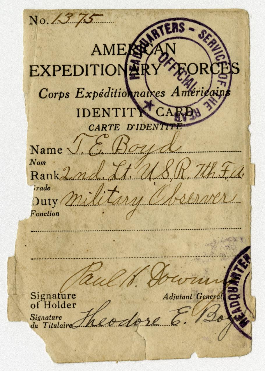 A paper document serving as a military identification card during World War I, with the name, rank, and duty of the person identified.